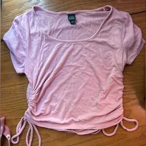 Cropped pink ribbed short sleeve top with ruched sides